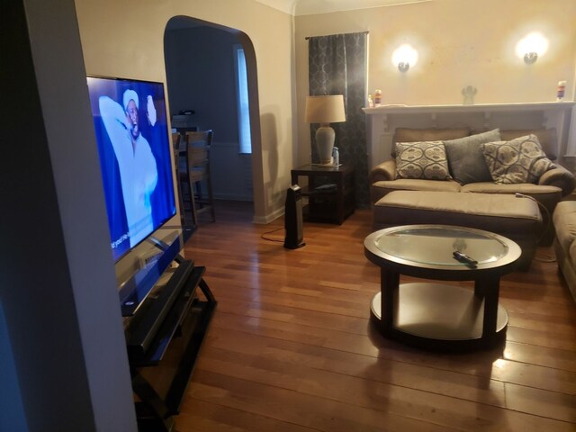 16115 Westbrook St, Detroit, MI 48219 - living area with arched walkways and hardwood / wood-style flooring