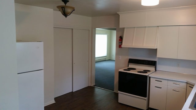 kitchen with white appliances, white cabinets, a baseboard heating unit, light countertops, and dark wood-style flooring