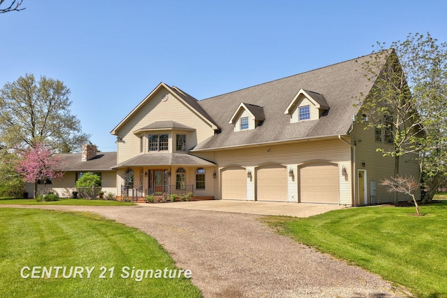 4285 N Iva Rd, Hemlock, MI 48626 - view of front of property featuring asphalt driveway, a front lawn, an attached garage, a porch, and a shingled roof