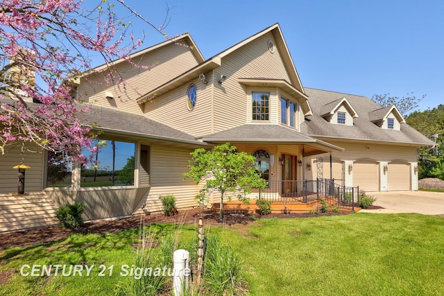 4285 N Iva Rd, Hemlock, MI 48626 - view of front facade with covered porch, driveway, a front lawn, and a shingled roof