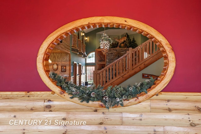 4285 N Iva Rd, Hemlock, MI 48626 - stairway featuring a chandelier