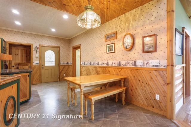 4285 N Iva Rd, Hemlock, MI 48626 - dining area featuring a wainscoted wall, recessed lighting, wood walls, crown molding, and wallpapered walls
