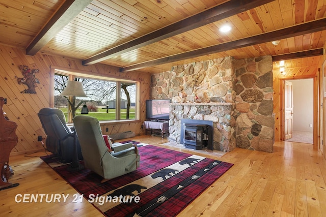 4285 N Iva Rd, Hemlock, MI 48626 - living area featuring beam ceiling, hardwood / wood-style floors, wood walls, and wood ceiling