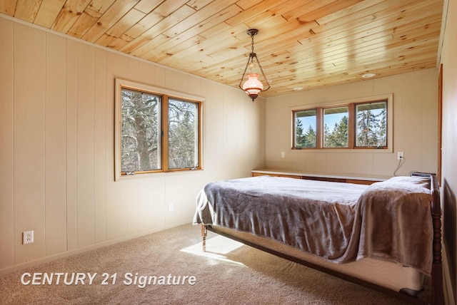 4285 N Iva Rd, Hemlock, MI 48626 - carpeted bedroom with wooden ceiling and wood walls