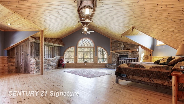 4285 N Iva Rd, Hemlock, MI 48626 - bedroom featuring a fireplace, wood-type flooring, wood ceiling, wood walls, and lofted ceiling