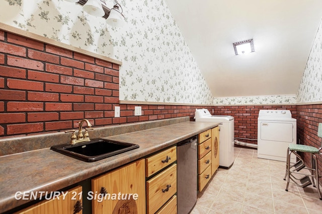 4285 N Iva Rd, Hemlock, MI 48626 - kitchen with wallpapered walls, a sink, independent washer and dryer, a wainscoted wall, and lofted ceiling
