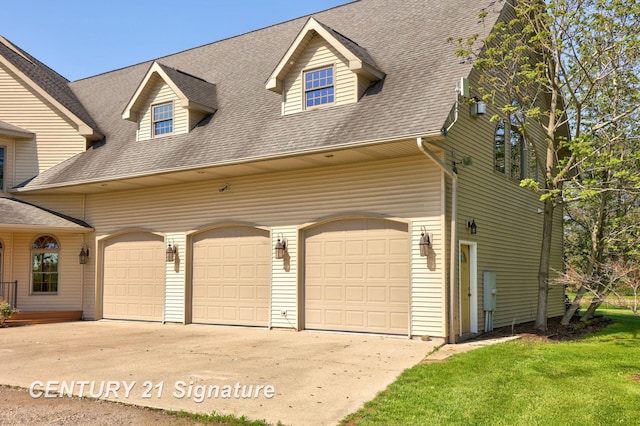 4285 N Iva Rd, Hemlock, MI 48626 - view of front of house with concrete driveway, a garage, a shingled roof, and a front yard