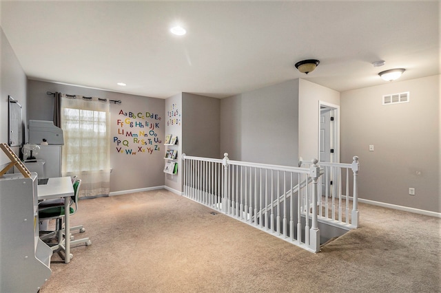 carpeted office featuring baseboards, recessed lighting, and visible vents