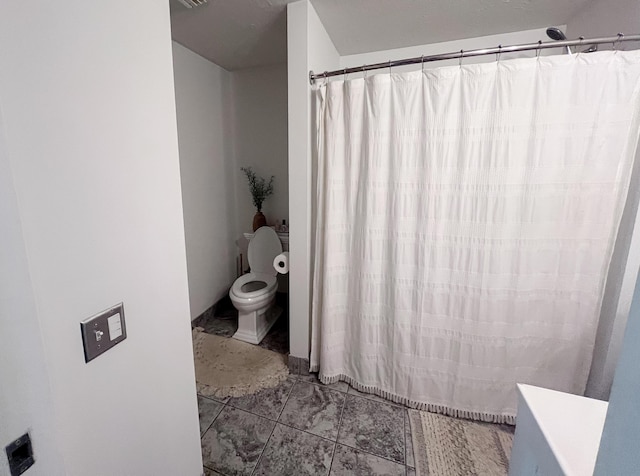 full bath featuring toilet