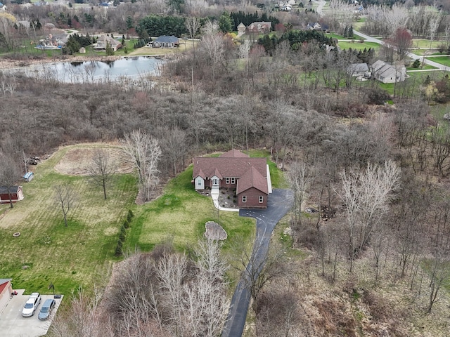 drone / aerial view with a water view