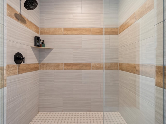 full bath with tiled shower