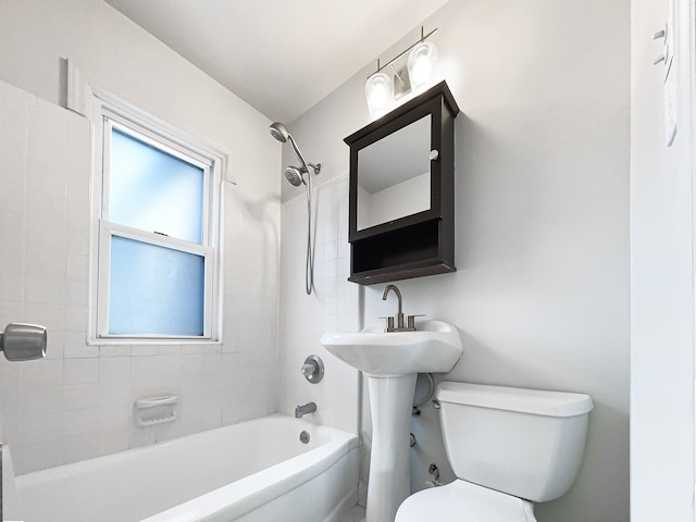 full bath featuring toilet and shower / washtub combination