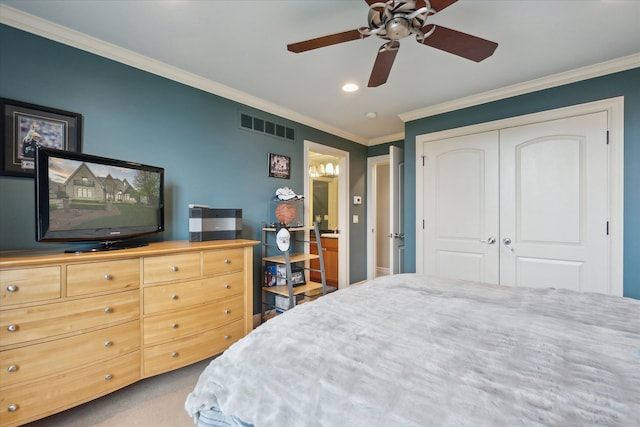 carpeted bedroom featuring crown molding, a closet, ceiling fan, and recessed lighting
