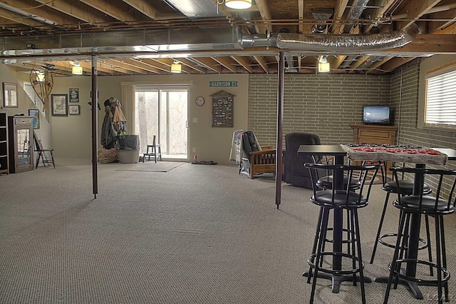 below grade area featuring carpet flooring