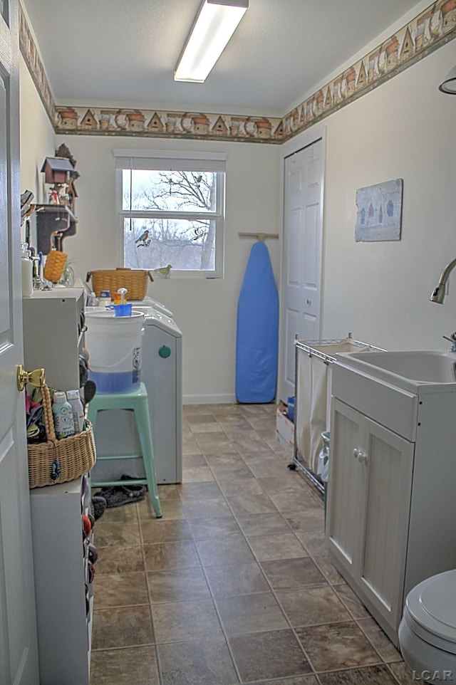 laundry room featuring a sink