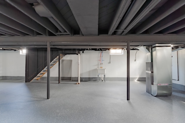 1182 Dudley Ave, Pontiac, MI 48342 - basement with stairs and heating unit