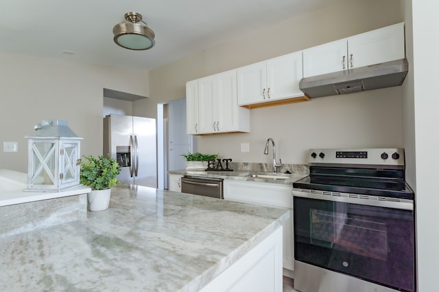 1182 Dudley Ave, Pontiac, MI 48342 - kitchen with light stone counters, white cabinetry, under cabinet range hood, appliances with stainless steel finishes, and a sink