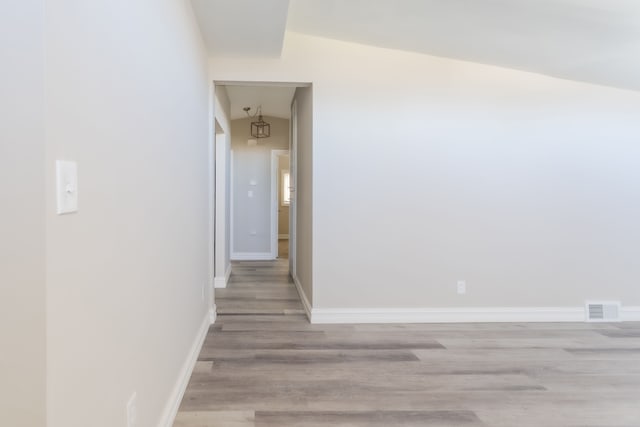 1182 Dudley Ave, Pontiac, MI 48342 - corridor featuring visible vents, baseboards, and light wood-type flooring