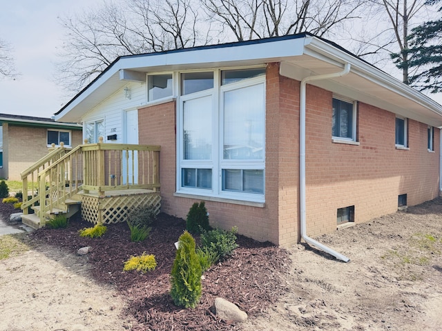 1182 Dudley Ave, Pontiac, MI 48342 - view of side of property featuring brick siding and crawl space