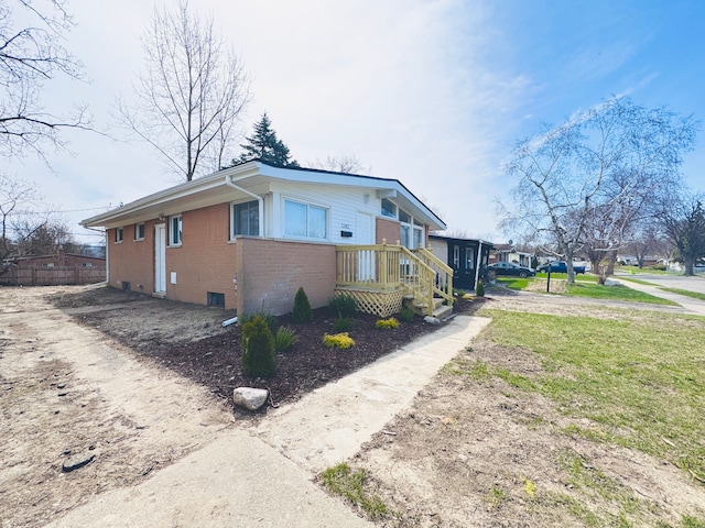 1182 Dudley Ave, Pontiac, MI 48342 - view of home's exterior featuring brick siding