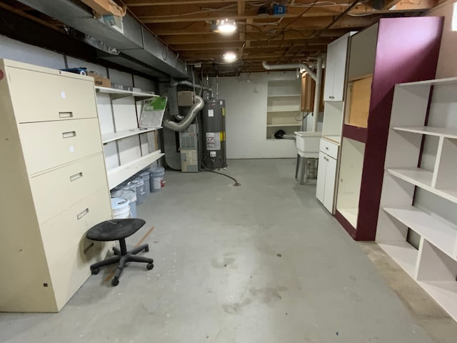 unfinished basement featuring heating unit, water heater, and a sink