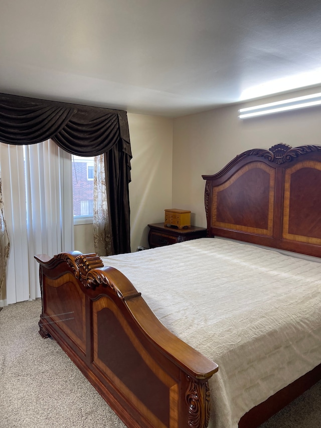 bedroom featuring carpet