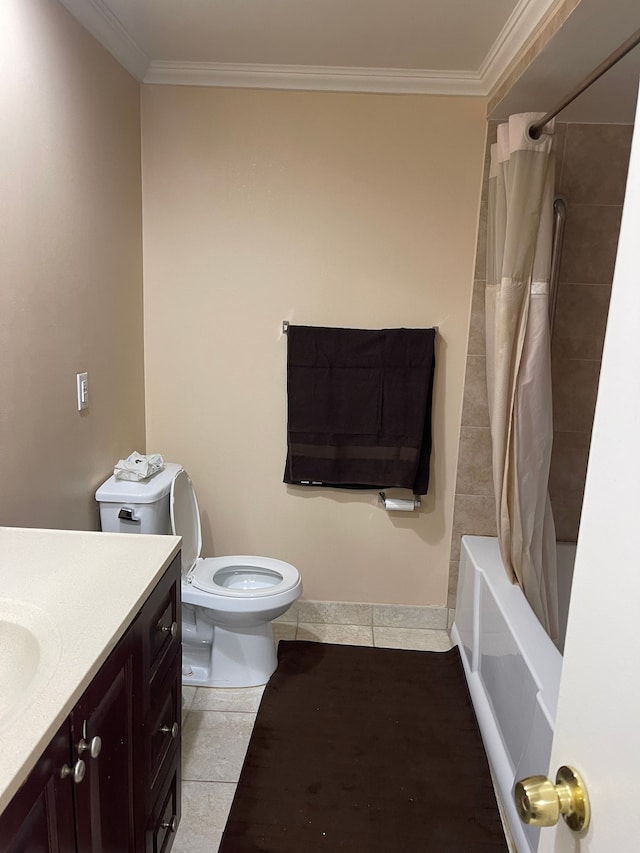 bathroom featuring crown molding, vanity, tile patterned flooring, and toilet