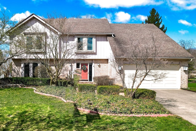 view of front of home featuring roof with shingles, an attached garage, driveway, brick siding, and a front yard