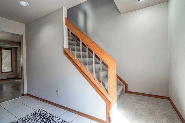 stairs with recessed lighting, tile patterned flooring, and baseboards