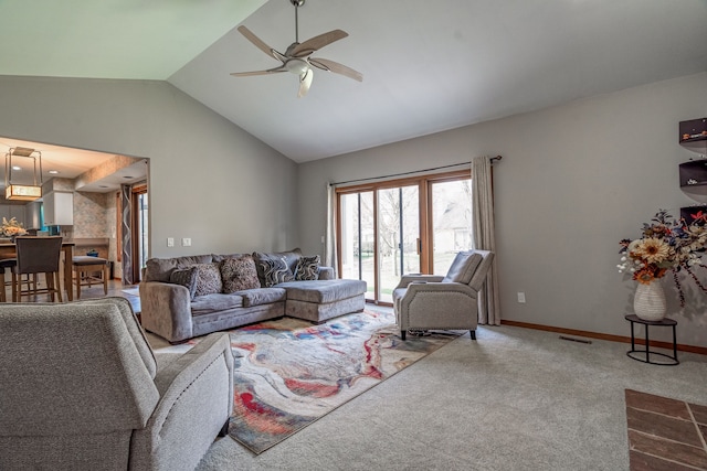 living area with ceiling fan, carpet floors, baseboards, lofted ceiling, and visible vents