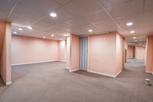 finished below grade area featuring baseboards, carpet flooring, and recessed lighting