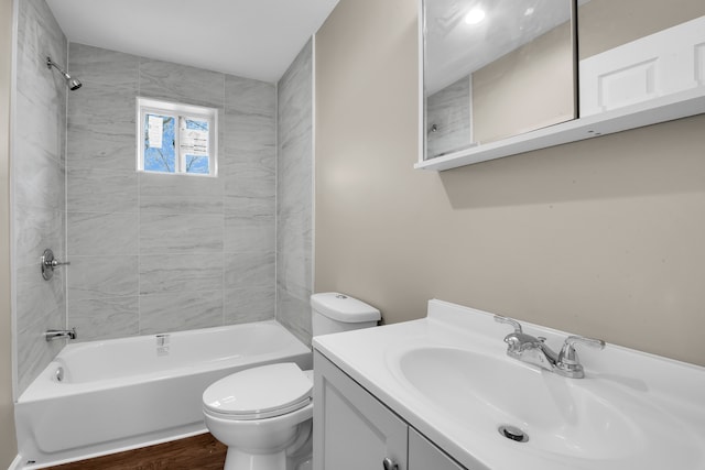 12751 Rosemary Blvd, Oak Park, MI 48237 - full bath with vanity, wood finished floors, toilet, and shower / washtub combination