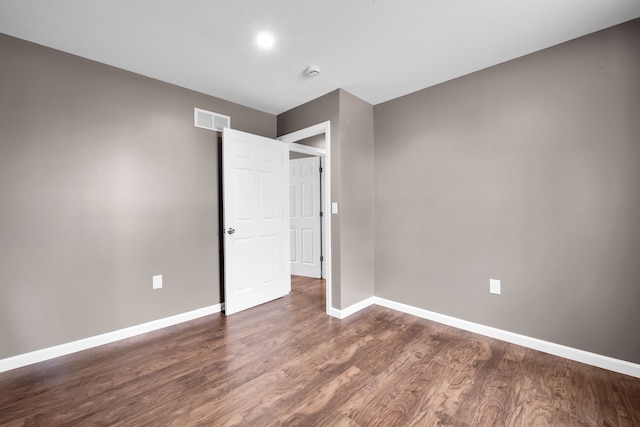 12751 Rosemary Blvd, Oak Park, MI 48237 - unfurnished bedroom with visible vents, baseboards, and wood finished floors