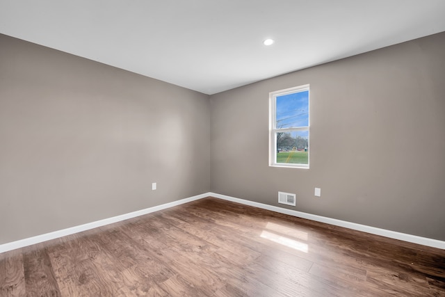 12751 Rosemary Blvd, Oak Park, MI 48237 - empty room with visible vents, baseboards, recessed lighting, and wood finished floors