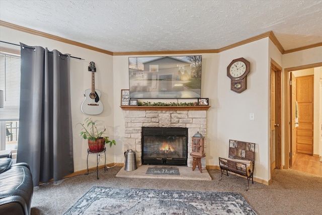 carpeted living area with ornamental molding, baseboards, a textured ceiling, and a fireplace