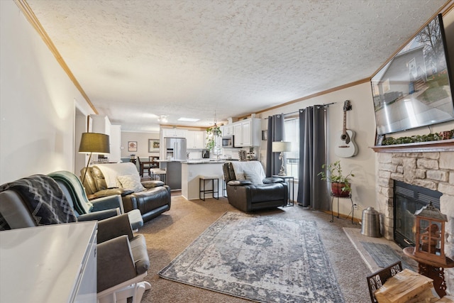living room with ornamental molding, a stone fireplace, light carpet, and a textured ceiling