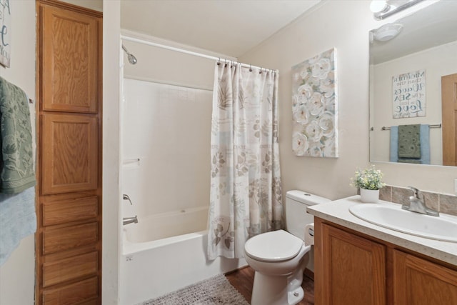 bathroom with toilet, shower / bathtub combination with curtain, vanity, and wood finished floors