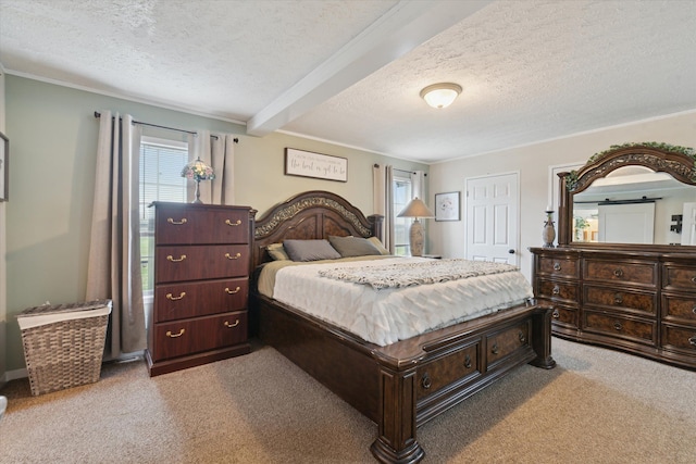 bedroom with a textured ceiling, beamed ceiling, and carpet floors