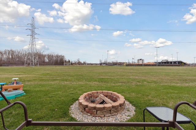 view of yard featuring a fire pit