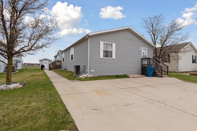 view of property exterior featuring a lawn