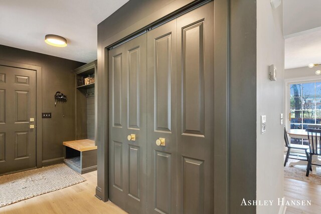 mudroom with light wood-type flooring