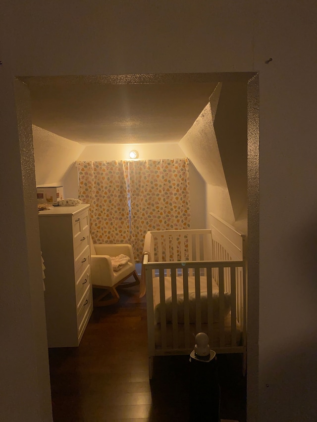 4519 Washington St, Wayne, MI 48184 - bedroom featuring lofted ceiling and dark wood-style flooring