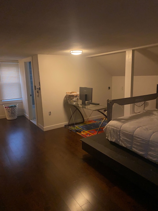 4519 Washington St, Wayne, MI 48184 - bedroom featuring vaulted ceiling, baseboards, and wood finished floors
