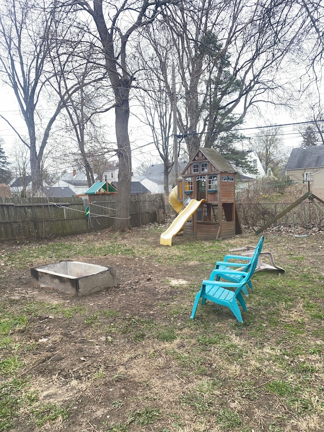 4519 Washington St, Wayne, MI 48184 - view of yard with fence and a playground
