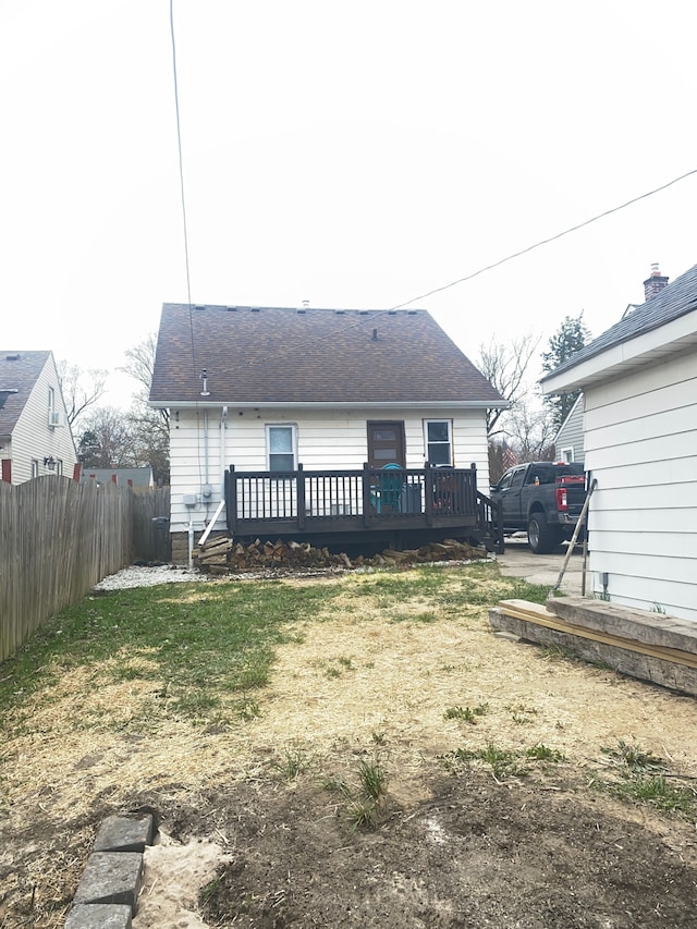 4519 Washington St, Wayne, MI 48184 - rear view of house featuring fence and a deck