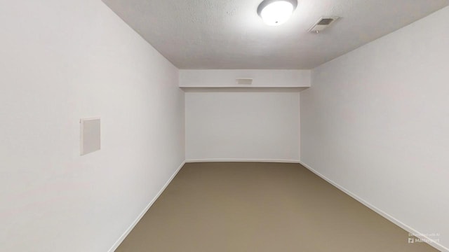 interior space featuring visible vents, baseboards, and carpet floors