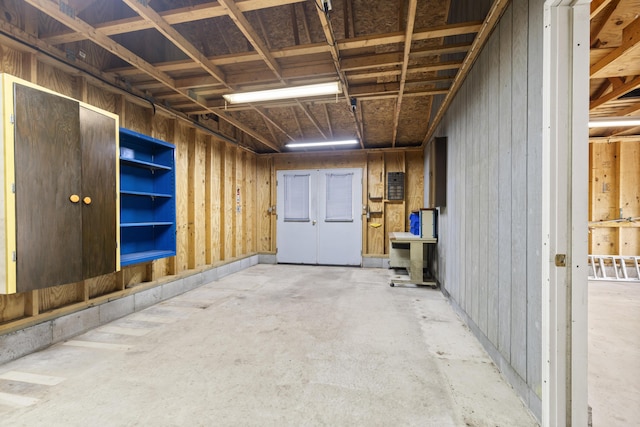 interior space featuring unfinished concrete flooring