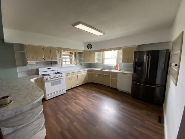 kitchen featuring tasteful backsplash, white appliances, light countertops, open shelves, and dark wood-type flooring