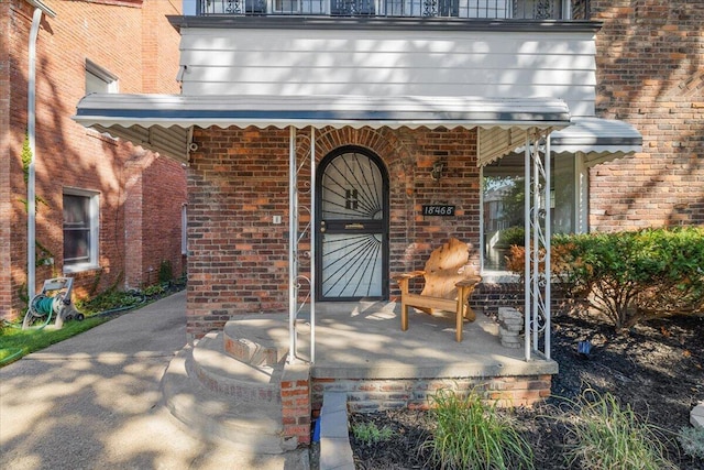 18468 Santa Barbara Dr, Detroit, MI 48221 - property entrance featuring brick siding and covered porch