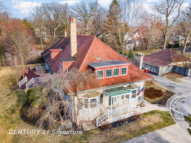 105 Parkwood Ct, Bay City, MI 48706 - rear view of property featuring a porch and a chimney